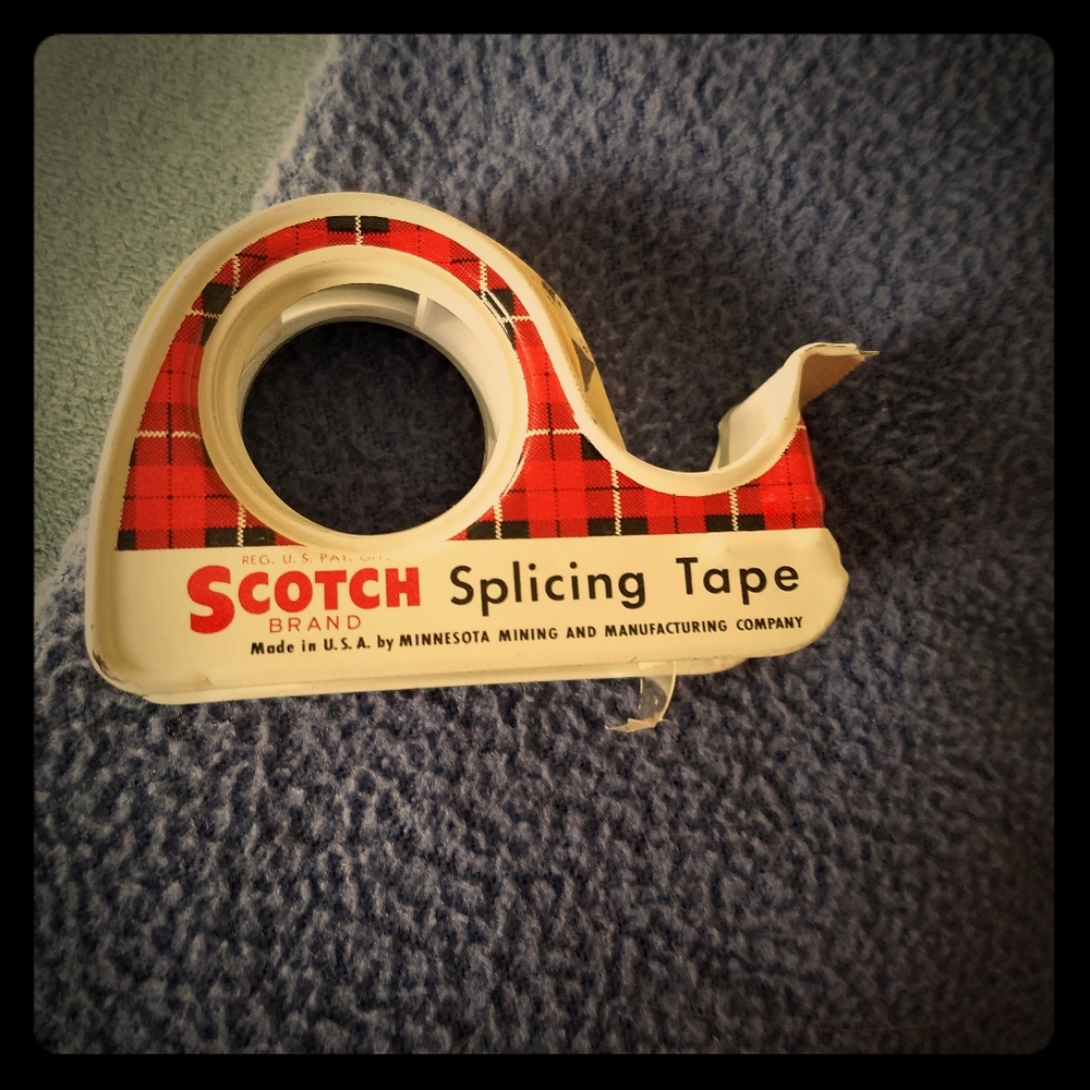 Vintage scotch metal dispenser